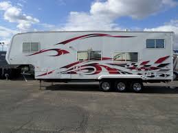 Each road warrior toy hauler model comes with beautiful bordeaux cabinetry throughout, a washer/dryer prep in all models, brushed nickel hardware and fixtures here at fun town rv houston you will find great prices and a great selection of heartland road warrior toy haulers for sale. Rv For Sale 2007 Weekend Warrior Le3105 5th Wheel Toy Hauler 31 In Lodi Stockton Ca 5th Wheel Toy Hauler Toy Hauler Rv For Sale