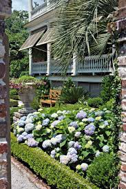 Pin By Sarah Eschan On Outdoor Ideas Charleston Gardens Southern Garden Outdoor Gardens