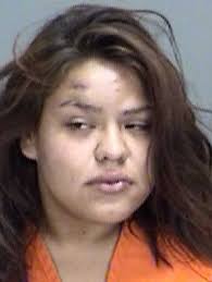 Woman accused of assaulting father with knife