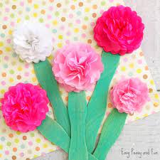 This adorable paper flower craft is perfect for welcoming spring in your home. Tissue Paper Flower Craft Easy Peasy And Fun