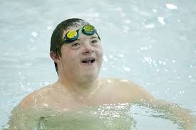 LTHS swimmer with Down syndrome inspires teammates