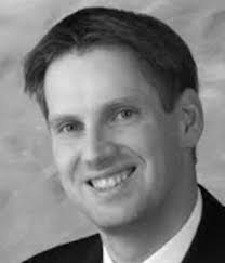 A phase-locked loop with a jitter of 50 fs for astronomy applications