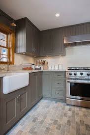 Sherwin Williams Warm Stone Paint For Our Kitchen Cabinets Outdoor Kitchen Cabinets Kitchen Cabinets Decor Brown Kitchens