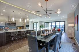 5 pcs dining table set, modern bar table set with 4 chairs, home kitchen breakfast table and chairs set ideal for pub, living room, breakfast nook, easy to assemble (rustic brown) 3.6 out of 5 stars. Sleek Modern Kitchen Design With A Large Kitchen Peninsula And Stock Photo Picture And Royalty Free Image Image 97874026