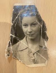 Could someone please restore this photo of us children with my late mum  it's the only one we have thank you