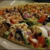 Pizza hut's small 8 personal pizza has four to six slices, serves one or two, and costs $9.99. 3