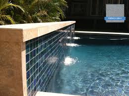 These Beautiful Tiles Blend Smoothly With The Water Color Created By Hydrazzo French Gray Huber Pool Maui Hi Swimmingp Pool Houses Pool Colors Pool Plaster