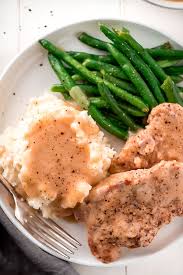 Add remaining flour to cooking juices in crock pot. Slow Cooker Pork Chops And Gravy Video Garnish Glaze