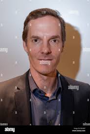 Hamburg, Germany. 12th Dec, 2018. Adam Bowen, founder of the e-cigarette  manufacturer "Juul", looks into the photographer's camera at the Hotel  Tortue. "Juul" is the market leader for e-cigarettes in the USA