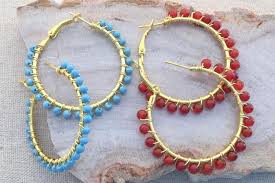 To feed beads or a dangle onto your new earring wires, slide the dangle onto the back end, over the curve and down into the small loop with the ball head. 9 Easy Beaded Earrings You Can Make Now Beaded Hoop Earrings Beaded Earrings Wire Wrapped Earrings