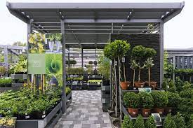 What is the best online garden seed store or where is the best place to look for decor and supplies? Next Home And Garden By Dalziel And Pow Shoreham Uk Store Design Garden Ideas Next To House Backyard Greenhouse Next At Home