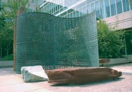 At the end of message two is the phrase id by rows. The Kryptos Sculpture