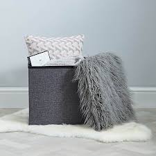 This chic faux fur ottoman will add modern sophistication to your living space. Grey Faux Fur Foldable Cube Ottoman Dunelm