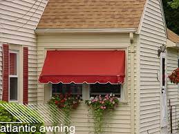 Here Is A Residential Pull Up Awning Used To Shield Both The Home And The Window Flower Boxes From Too Much Sunlight