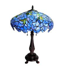 Simple lamps like an acorn are much less valuable than complex forms like dragonfly's or wisteria. Lilac Wisteria Tiffany Table Lamp