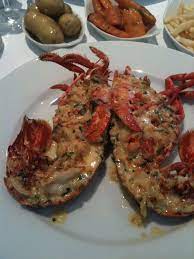 The very definition is lobster meat, cooked in a cream sauce, returned to it's shell, sprinkled with cheese and baked to perfection. Lobsters At Rick Steins Seafood Restaurant In Padstow Seafood Restaurant Travel Food Food
