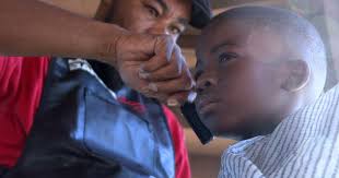 VIDEO: EmVP: Barbers give free back-to-school haircuts at Columbia event