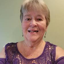 Carol Smith If you wanted to feel loved or to see a beautiful smile, you  sat next to Carol Elaine (Hunter) Smith. Even in her final days facing  dementia, she still carried