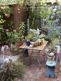 5 Bohemian Gardens That Will Make You Excited For Spring Design District Small Courtyard Gardens Courtyard Gardens Design Small Cottage Garden Ideas