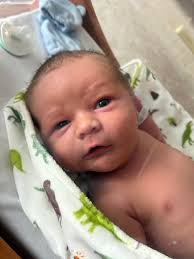 I think the coolest part is seeing his movements knowing which twitch  patterns would have me reacting the most. This kid loves touching his face  and holding his own hands.