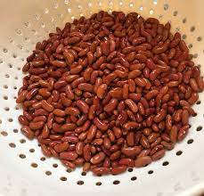 Beans soaking in a bowl of water with some dried ones laying around the dried beans are a versatile, affordable source of protein, fiber, starches, iron, b vitamins, potassium. A Kitchen Myth Buster You Don T Need To Soak Beans Where Nola Eats Nola Com
