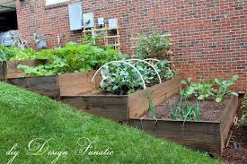Diy Design Fanatic Raised Bed Update Building A Raised Garden Sloped Garden Diy Raised Garden