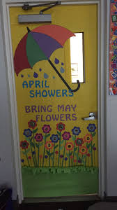 April Showers Bring May Flowers Door Students Pics In Center Of Flowers Spring Classroom Door Door Decorations Classroom Spring Door Decoration