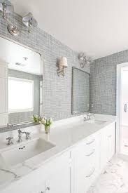 However, wallpaper can work on a wall behind. Beautiful White And Gray Bathroom Is Clad In Gray Textured Wallpaper Accenting Marble Herringb Bathroom Wallpaper Modern Grey Bathrooms Grey Textured Wallpaper