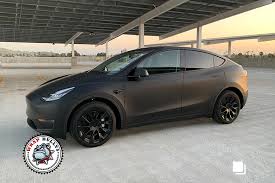 It is difficult from your photo to tell how much gloss is in the stripes. 3m Deep Matte Black Wrap Bullys
