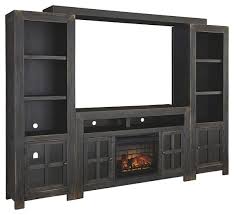 However, instead of only featuring storage space, these pieces of furniture incorporate electric fireplaces, too. Gavelston 4 Piece Entertainment Center With Electric Fireplace W732w6 23 24 25 38 W100101 Tv Stands And Media Centers Bargain Mart Furniture