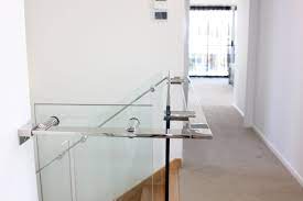 Frameless Glass Staircase Balustrade With Custom Made Stainless Steel Handrails And Standoffs Glass Balustrade Stainless Steel Handrail Handrails