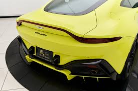 Image result for New Yellow 2019 Aston Martin