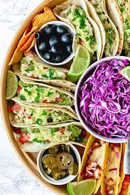Add the onion and cook for about 10 minutes, until tender. Easy Taco Dinner Party Board With 2 Different Taco Recipes The Yummy Bowl
