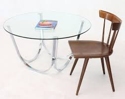 Would look ideal in your living room, with a set of four wooden chairs. Tall Round Center Coffee Table Chrome And Glass For Sale At 1stdibs