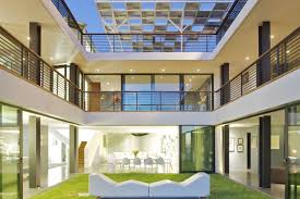 Play with water fountains nested with a backdrop of wall sculptures of krishna and ganesha, using water as a tool to herald peace and prosperity. U Shaped House Courtyard Houzz