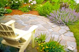 A brick patio can be constructed with bricks laid in a sand bed over a gravel base, or laid in a mortar bed over a concrete base. How To Build An Easy Diy Patio Better Homes Gardens