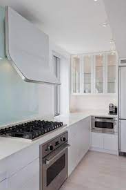 Wall mounted hoods are the most popular type of vent hood which are installed directly in your kitchen wall and over the cooking range. 40 Contemporary Kitchen Hoods Ideas Kitchen Hoods Contemporary Kitchen Kitchen Extractor