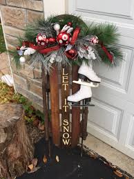 Vintage Sled With Toddler Ice Skates Love How This Came Out Found Christmas Decorations Diy Outdoor Christmas Sled Decoration Outdoor Christmas Decorations