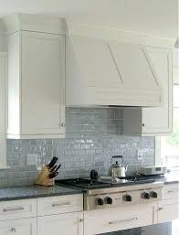 This kitchen backsplash with a pale blue mosaic tile grid provides the perfect backdrop (literally) for this kitchen's retro style. Light Blue Grey Kitchen Backsplash Novocom Top