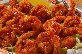 Melt butter in large skillet over medium heat, add garlic and swirl a minute or 2, then add hot sauce. Budweiser Crispy Buffalo Shrimp Recipe Made With Budweiser Mild Wing Sauce From Peppers Com Cape Gazette