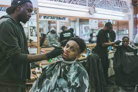 The barber simply cuts the sides and back of your hair but leaves the top and blows it out with a blowdryer to create the blowout look. How The Barbershop Became A Bastion For The Black British Community