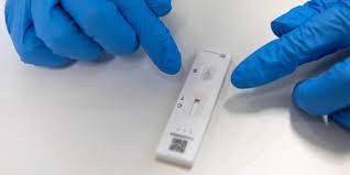 Drops of liquid are added to the test strip and after. We Need Lateral Flow Testing Here S How To Make It Work Lse Covid 19