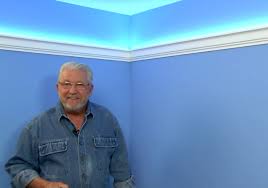 Create a network of outlines or borders on various planes of a sloped ceiling. Easy Inexpensive Cove Lighting Uses Foam Crown Molding And Led Light Tape Ron Hazelton