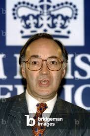 Image of Home Secretary Michael Howard annouces at a press conference the