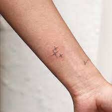 37 Beautiful And Small Moon And Stars Tattoo Collection If You Re Looking For A Tiny Tattoo To Get With Y Friend Tattoos Small Star Tattoos Small Star Tattoos