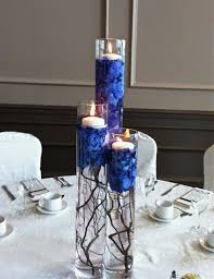 These Centerpieces But With Moss Green Petals Instead Of Those Blue Petals Flower Centerpieces Wedding Blue Wedding Flowers Beautiful Wedding Flowers