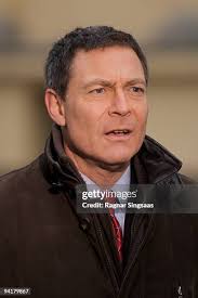 CNN correspondent Jonathan Mann looks