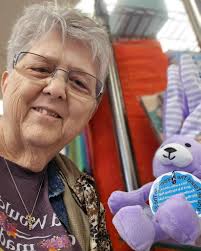 First shop in Butler, Missouri with rocking chair quilts