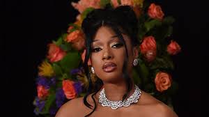 Megan thee stallion wins best new artist grammy; Megan Thee Stallion S Grammys 2021 Dress See Her Bold Orange Gown Stylecaster