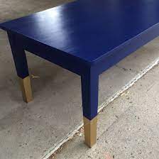 A coffee table is a vital piece of furniture that ties the whole living room together. Modern Blue Coffee Table Primed Painted And Finished In Navy Blue With Tips Dipped In Gold Blue Coffee Tables Modern Blue Coffee Table Gold Dipped Furniture